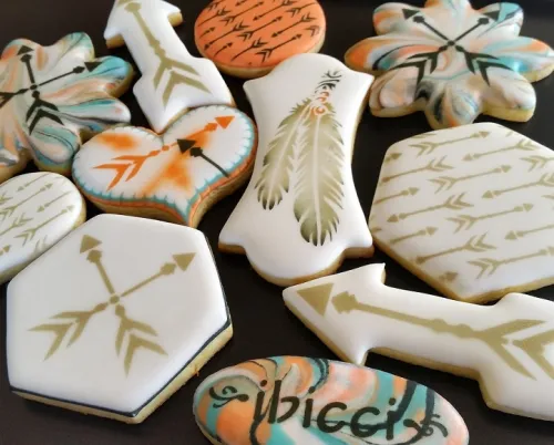 ibicci customn decorated cookies including the stencilled Tribal Feather cookies